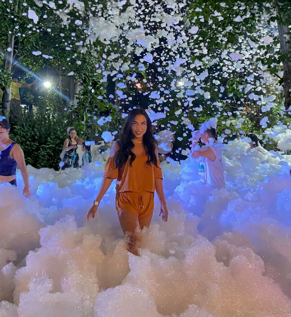 Nighttime foam party with lights